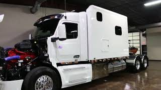 2022 Peterbuilt 579, 14.9 liter Cummins, ARI self contained sleeper, 12k miles