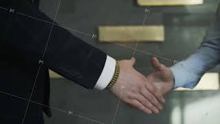 Businessmen shaking hands in the office, closeup. Action. Good deal, business concept, two men