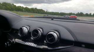 Ferrari F12 Berlinetta on TT circuit Assen with McLaren P1, Porsche 918, AMG  M5 and many more