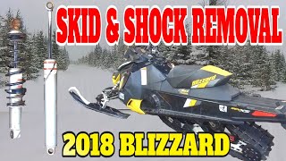 Pulling skid and removing rear shocks on Zuke's 2018 Blizzard