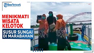 Menikmati Wisata Kelotok Susur Sungai di Marabahan