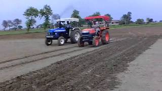 Kubota vs new holland.3gp