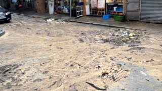 Experiencing the aftermath of flooded streets from a typhoon in Hong Kong.