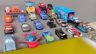 Disney Pixar Cars Various Cars miniature cars roll down a colorful slope and fall into the water!