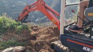 Terracing a hillside with Kubota KX41-3V mini excavator