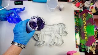 36/ holographic resin horse on light stand