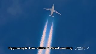 Hygroscopic Cloud Seeding and iridescence by aluminum