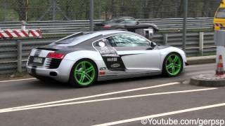 Audi R8 V8 with green rims and stickers