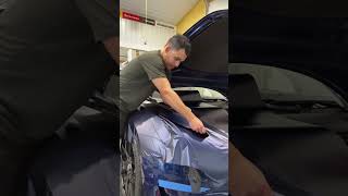 Vinyl Wrapping a Tesla fender in KPMF