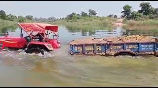 Mahindra Tractor crossing River with loaded trolly