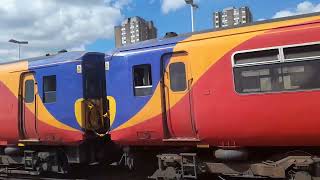 Class 455s departing Clapham Junction