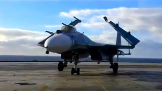 Su-33 'Flanker-D' work on aircraft carrier. Raw footage.