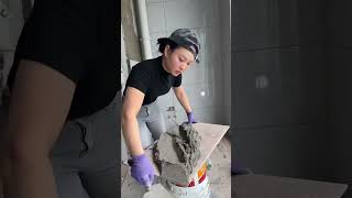 Girl Expert in Tile Work Demonstrating Impressive Skills