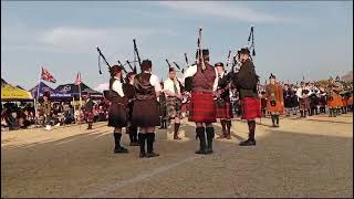 Massed bands play Amazing Grace