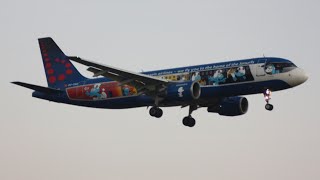 Brussels Airlines A320 'Aerosmurf' landing at Manchester Airport