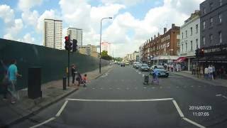 Pedestrian Rushing To Beat Ambulance