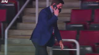 Toronto Maple Leafs GM Kyle Dubas rushes out of the press box after his captain Tavares is injured