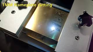 50W fiber laser marking machine cutting name on 1mm brass