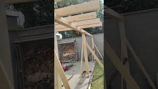 Installation of a wooden pergola. Counter top.