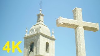 4K Free Stock Footage: Cross with Out of Focus Church in the Background