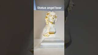 statue angel bear