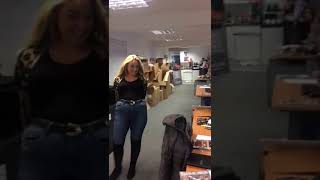 Blonde woman splits her jeans while dancing