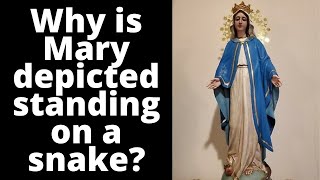 Why is Mary depicted standing on a snake?