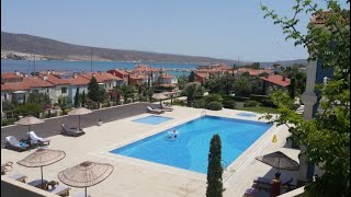 Çeşme ‘de Alaçatıport Yamaçevleri Satılık 1+1 Bahçe katı Daire