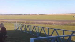 Roman Grosjean tests an F1 Lotus Renault on an airstrip