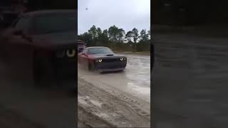 challenger hellcat pulls side by side through the mud