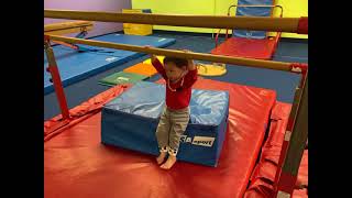 Sammi at little gym gymnastics hanging around