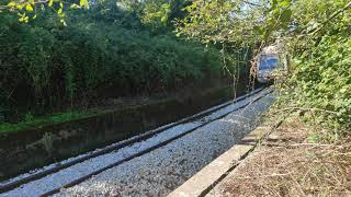 FEVE 3600-35-36 Por la estación abandonada de Oficinas con destino Gijón