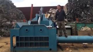 Y81T-2500 Automatic remote control scrap metal baler. Capacity is 35-50 tons/hour.