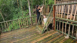 Building stairs and bamboo railings, perfecting the floors - single mother