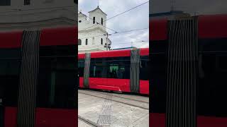 Red tramway passing on the road in Bratislava-Slovakia 🇸🇰