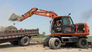 Doosan Excavator Loading Mud