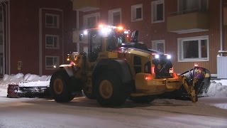 Volvo L110H with Arctic Machine sideplough and Ice ripping blade in snow clearing