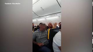 Shocking video of Germans passengers chant 'racist slurs' during RyanAir flight