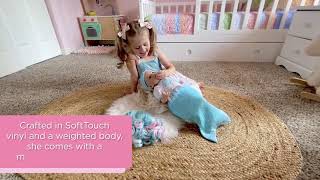 Paradise Galleries Mermaid Dreams Reborn Doll with removable rainbow wig & a slip-on mermaid tail