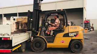 how to unload heavy load using forklift safely.