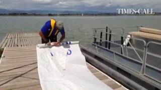 Rolling up the main sail at Union Reservoir in #Longmont.