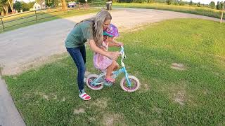 Olivias first time riding a bike without training wheels