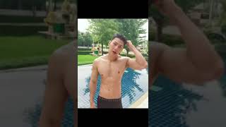 young fit Asian guy swimming pool and workout time top naked