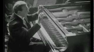 36" film video of Benno Moiseiwitsch playing piano