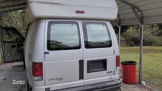 Installing mirror window tint on Ford Econoline van rear windows