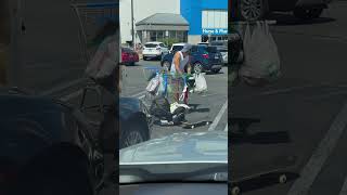 Dad carries baby and groceries on skateboard #walmart #skateboarding #short #exploremore #dad #baby