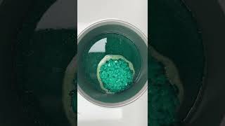 Timelapse of green wax beads melting to be used for hair removal!