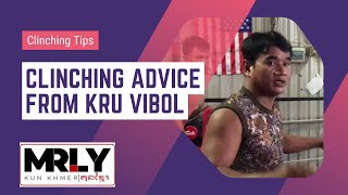 Kru Vibol teaching clinching techniques to MrLy fighters