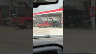 FORD RAPTOR ON FIRE WHILE PARKED AT THE GAS PUMPS