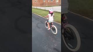 Lexi is getting confident on her 18" Hello Kitty bike just after a few minutes